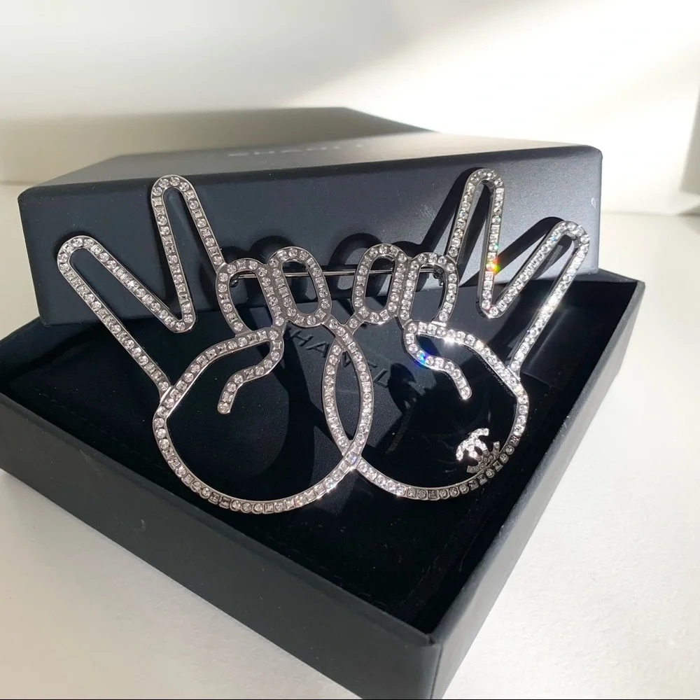Chanel large peace hands pin